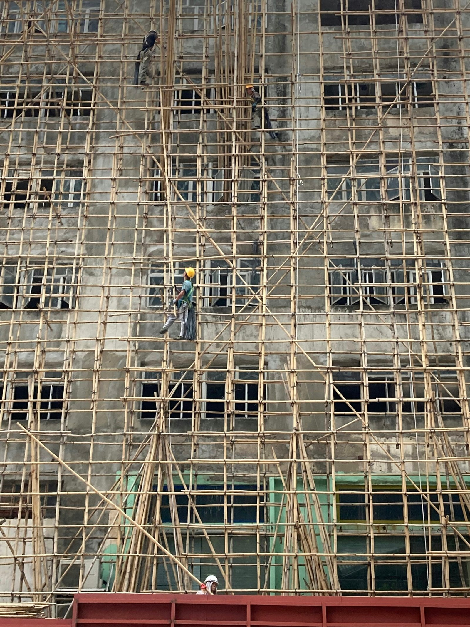 How to Present a Construction Budget Lenders Will Trust people walking on sidewalk near building during daytime