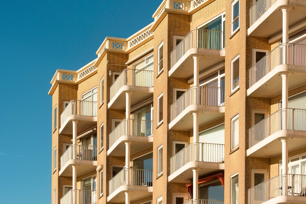 Brick multifamily property with private balconies for CRE Operational Transition & Bridge Loans | Thorne CRE