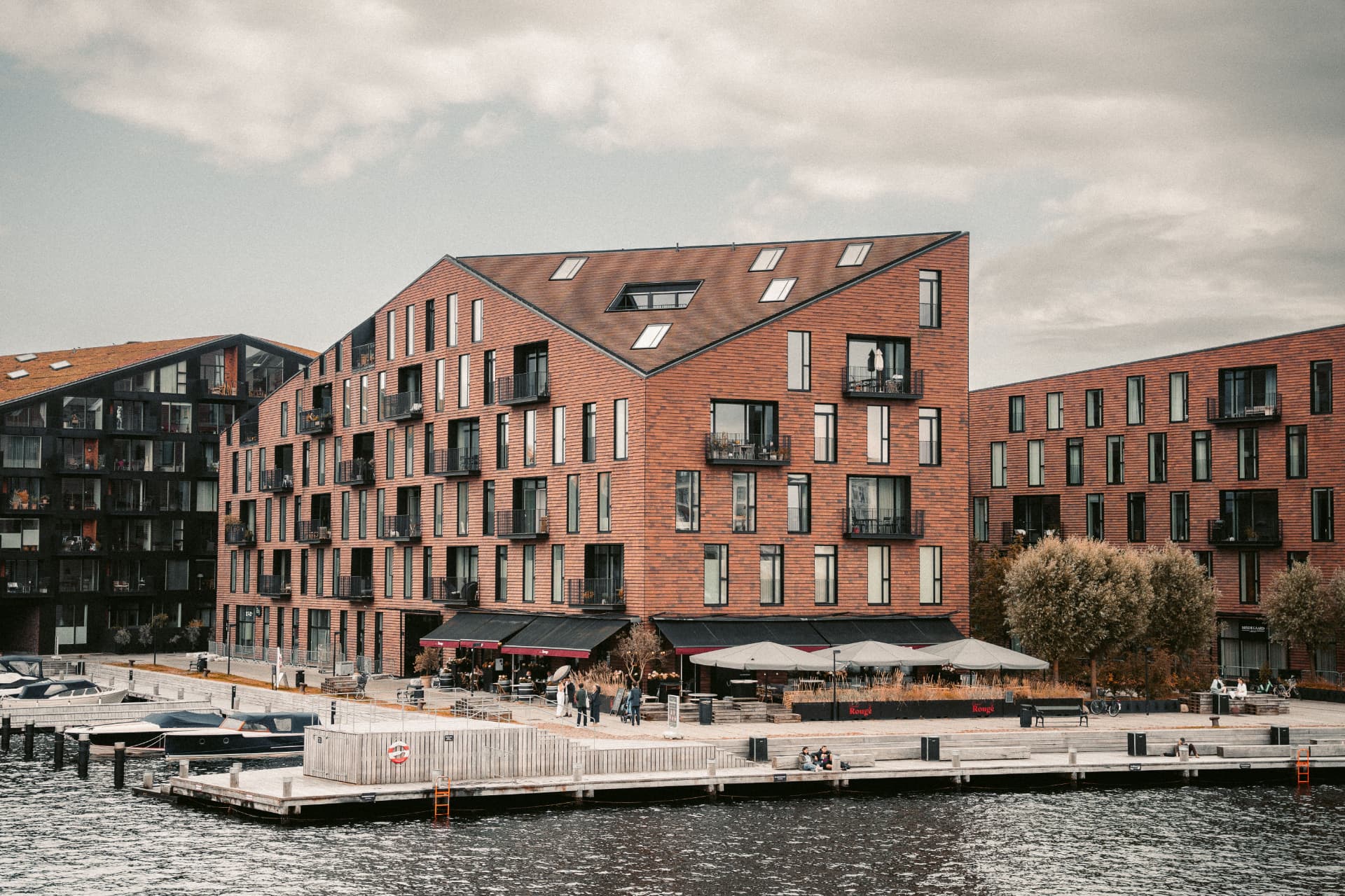 Waterfront brick apartment community with ground-floor retail for Medical Office Building Debt Brokers: Beyond the Giants